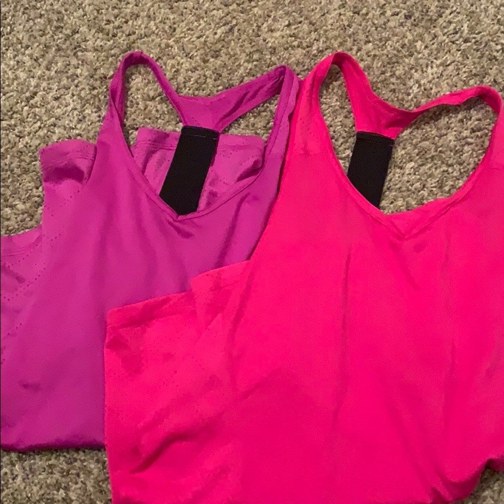 pink and purple running tank tops